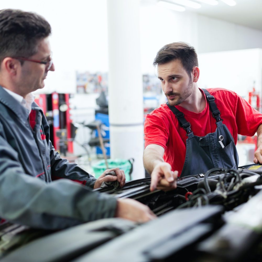 car-mechanics-working-at-automotive-service-center.jpg