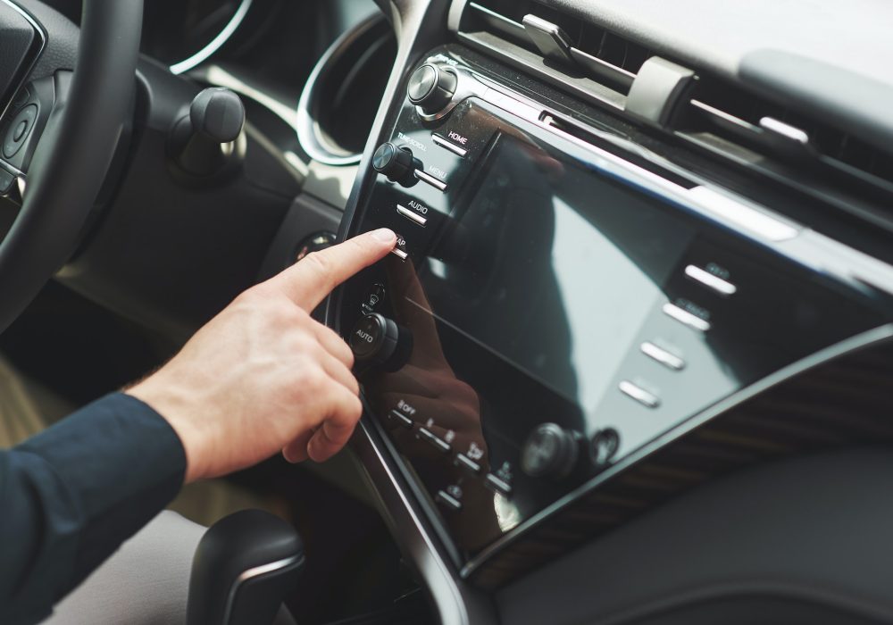 man-includes-an-audio-system-in-the-car.jpg man-includes-an-audio-system-in-the-car.jpg