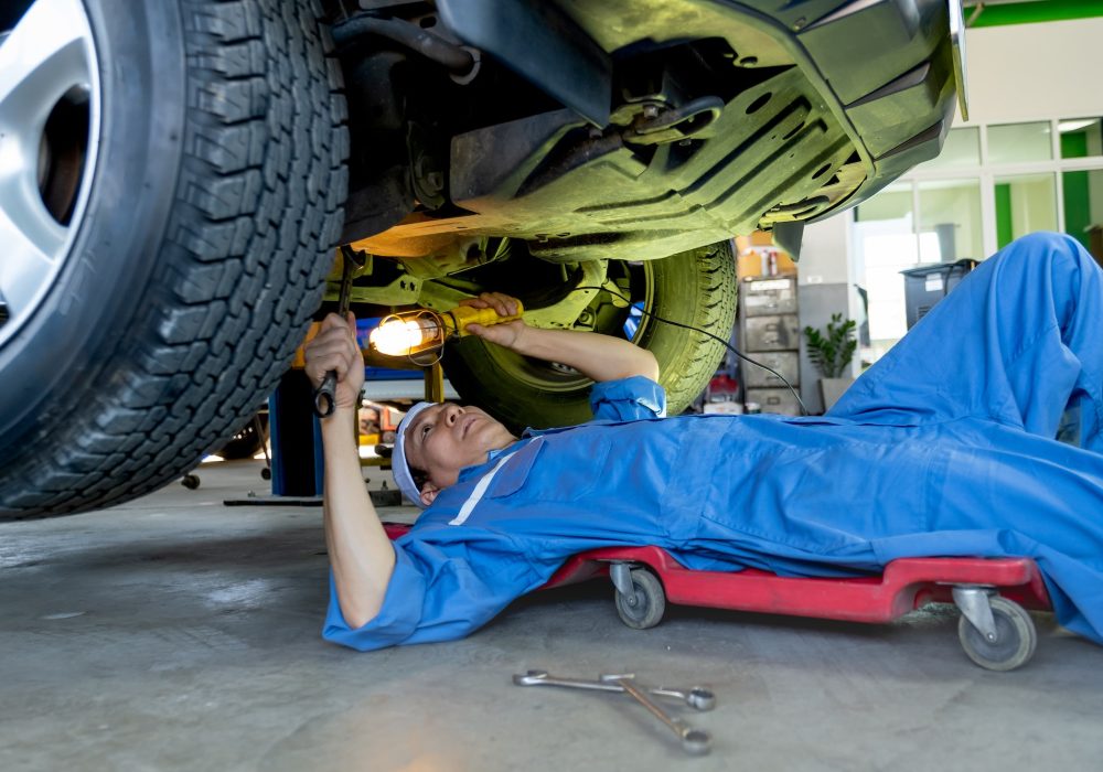 technician-or-garage-worker-lie-down-under-the-car-and-use-lantern-to-guide-for-fix-the-problem.jpg technician-or-garage-worker-lie-down-under-the-car-and-use-lantern-to-guide-for-fix-the-problem.jpg